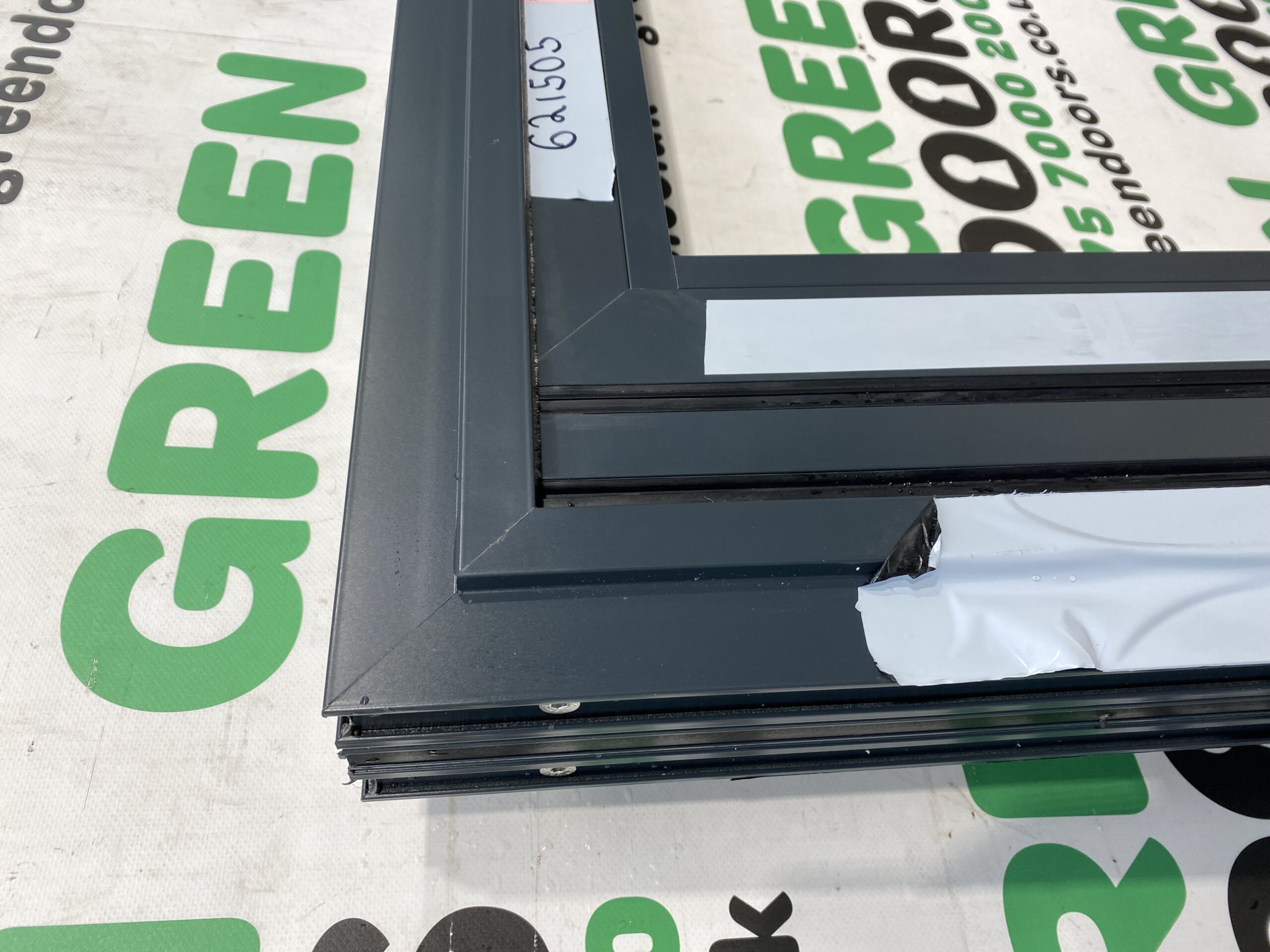 Aluminium Bi-fold window | Green doors