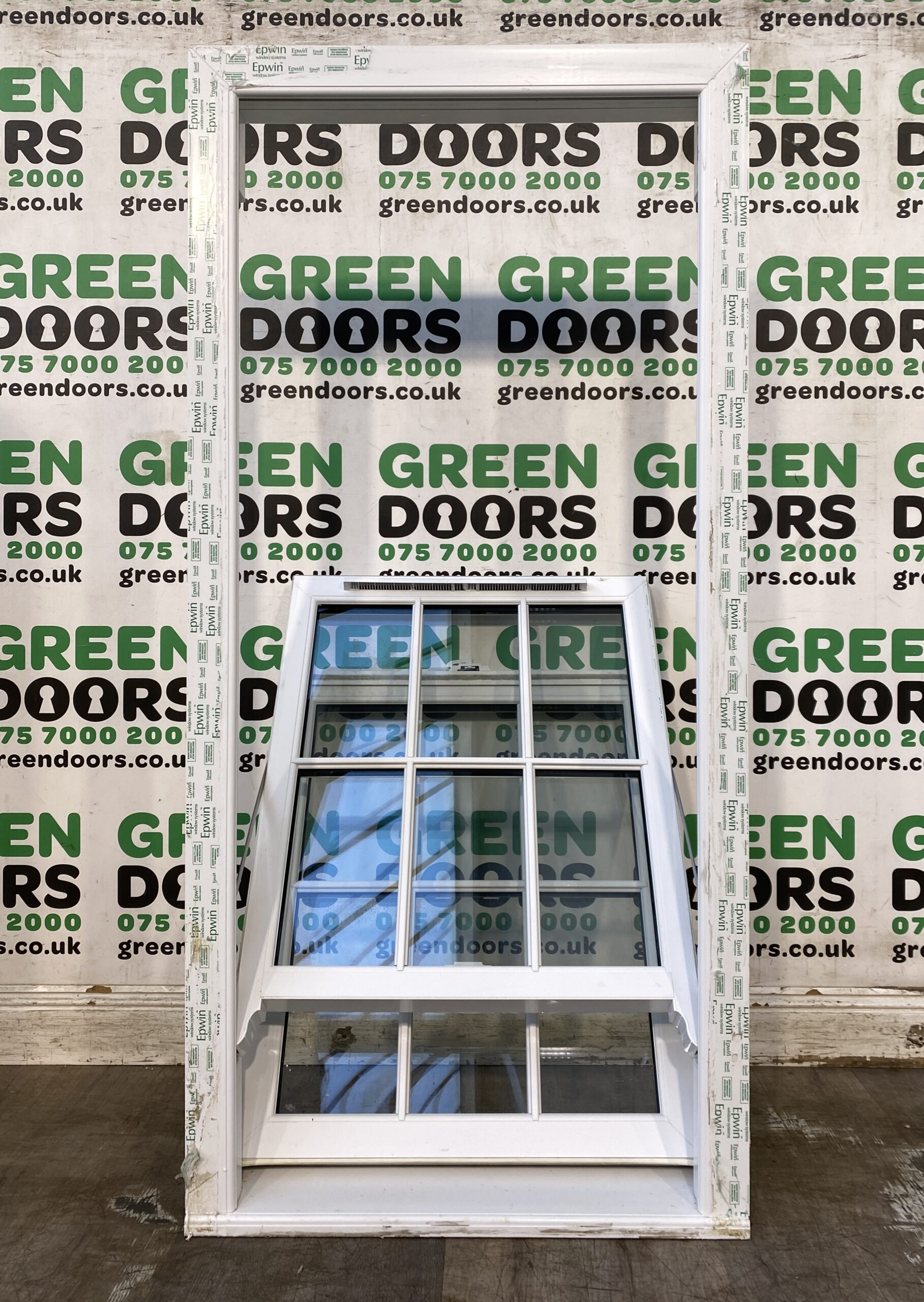 White uPVC Box sash window | Green doors