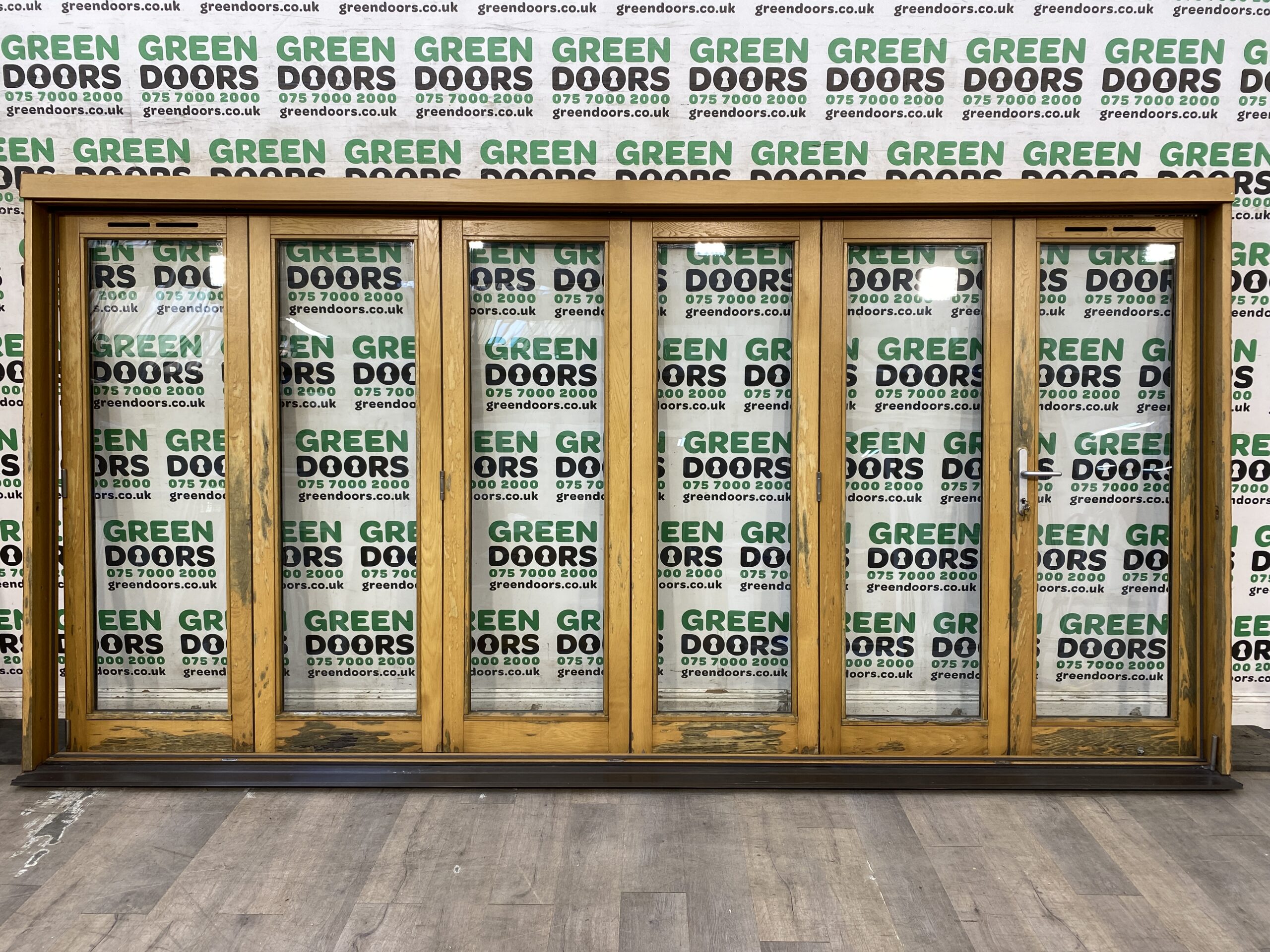 Original wood grain / varnished  Wooden Bi-folding doors